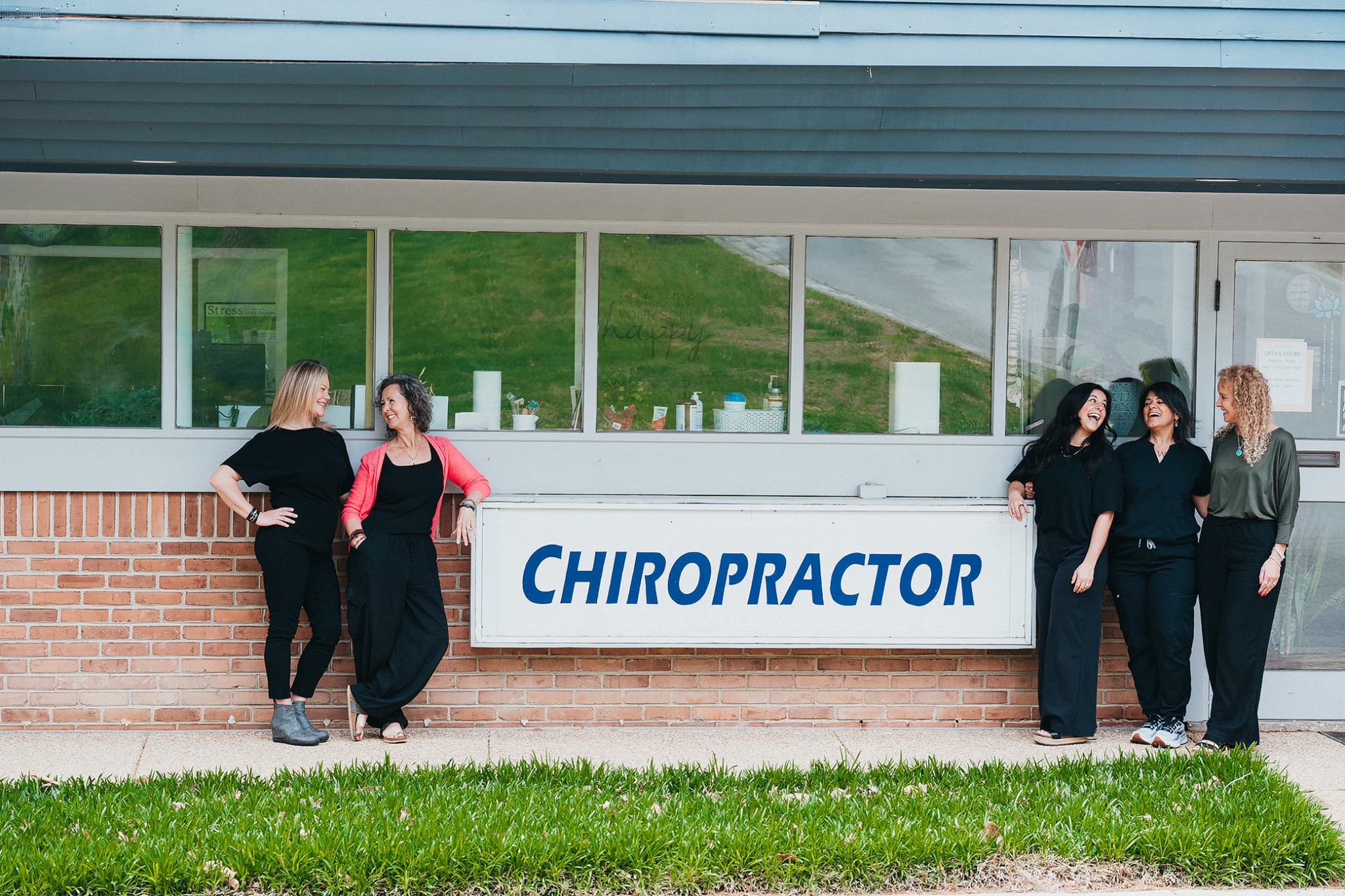 Chiropractic team outside their office