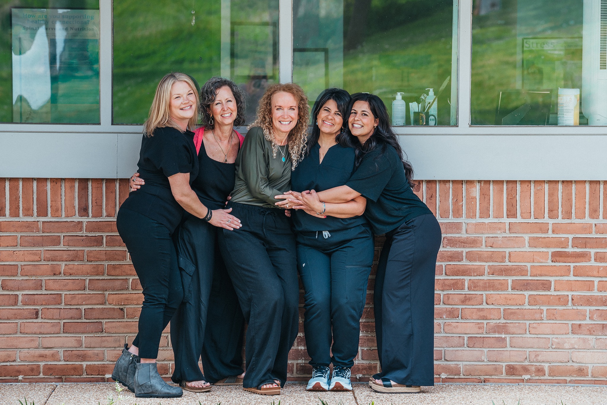 Chiropractic team portrait outside
