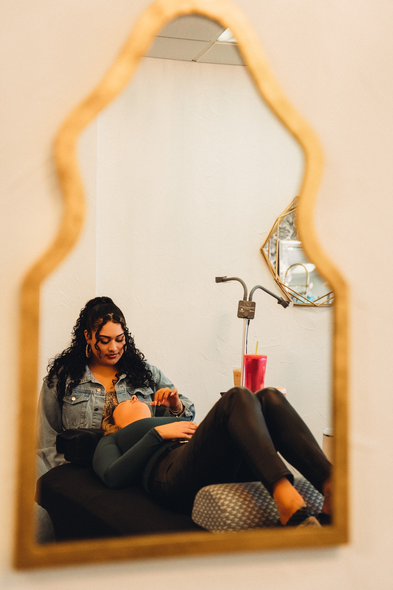 Beauty lounge lifestyle photograph reflected in a mirror