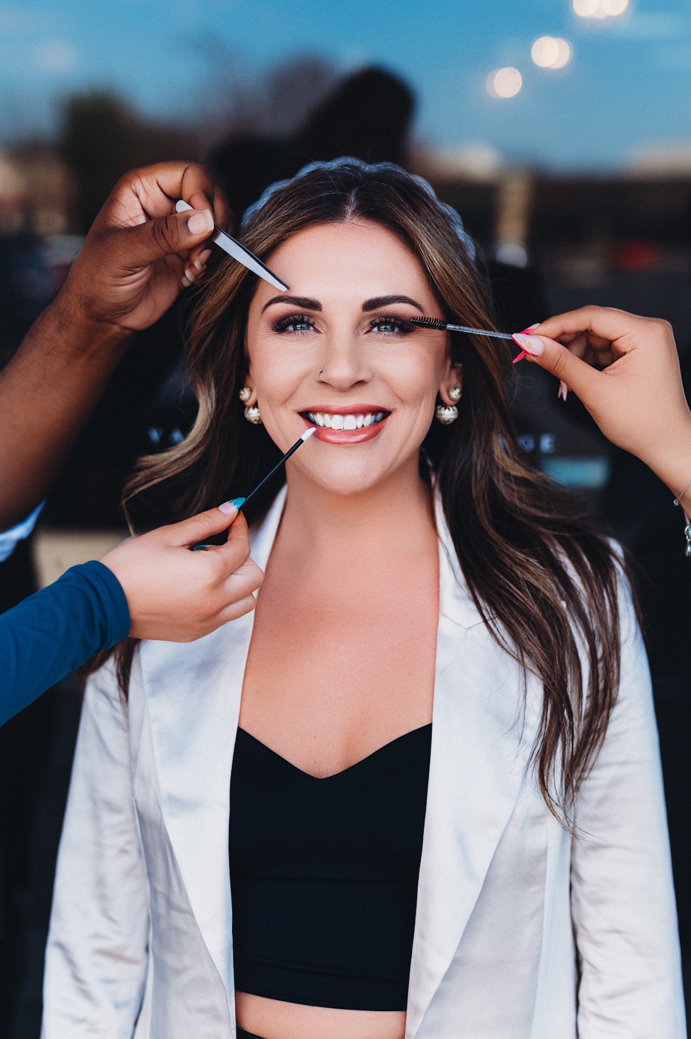 Beauty professional styling a client