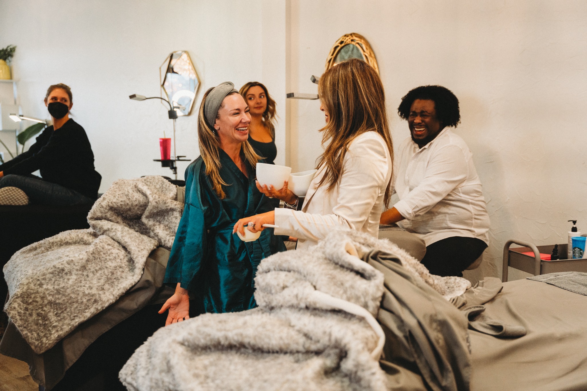 Clients and artists connecting inside the beauty lounge